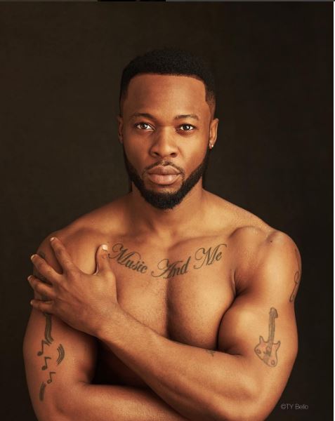 This Latest Photo Of Flavour With Half Naked Woman Has Got People Guessing