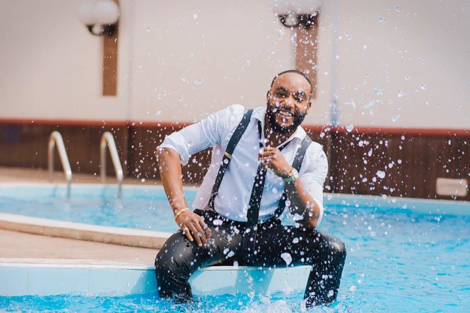Kcee Announces New Single With Series of WET Photos