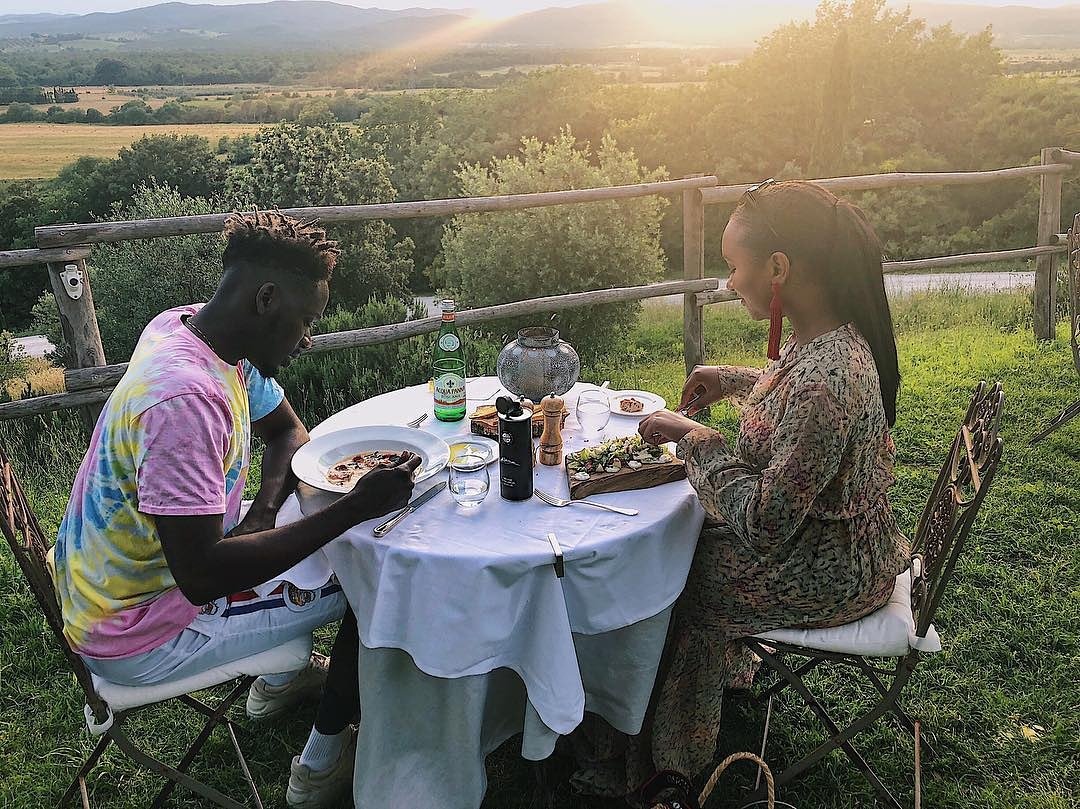 Mr. Eazi And Temi Otedola Take Special Time Out As They Travel For A Getaway To Italy