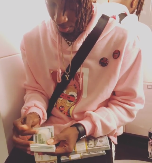 Rapper Yung6ix Shows Off Stacks Of $100 Bills