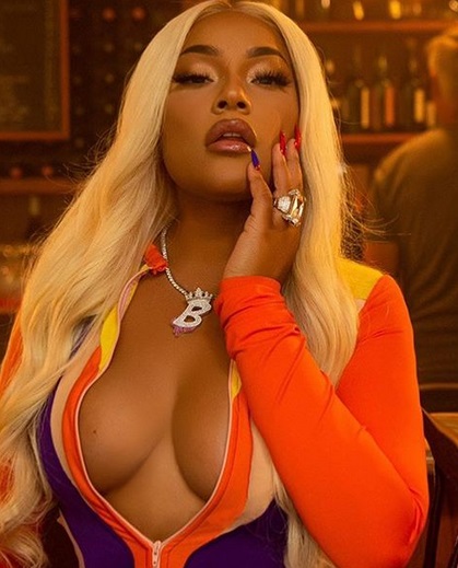 Burna Boy’s rapper girlfriend wears chest baring outfit
