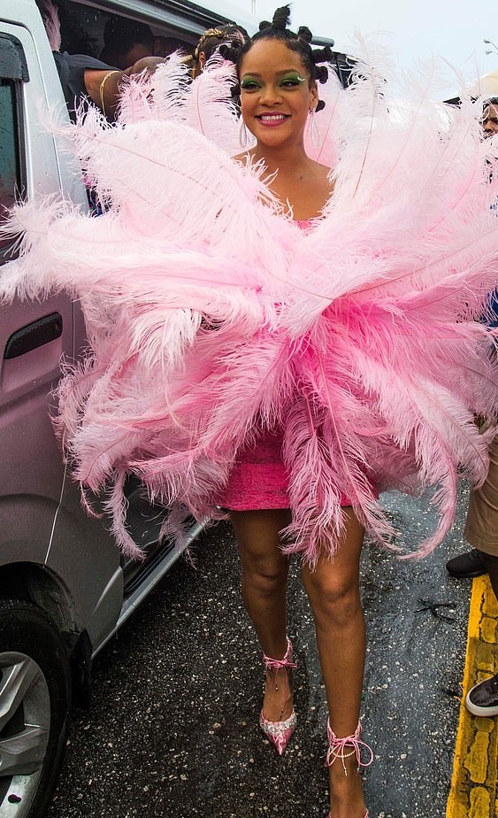 Rihanna steps out in flamingo feathered pink dress