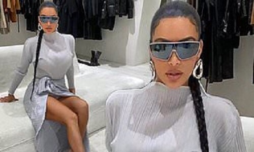 Photos: Kim Kardashian shows off a thigh length braid