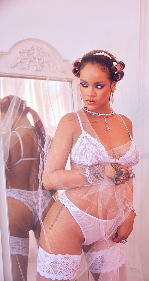Rihanna turns up the heat in lace lingerie as she models her new Savage x Fenty collection