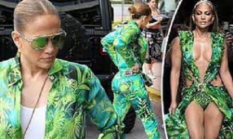 Jennifer Lopez rocks versace jungle print outfit very similar to her iconic green dress