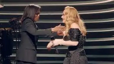 Singer, Adele tearfully reunites with childhood teacher