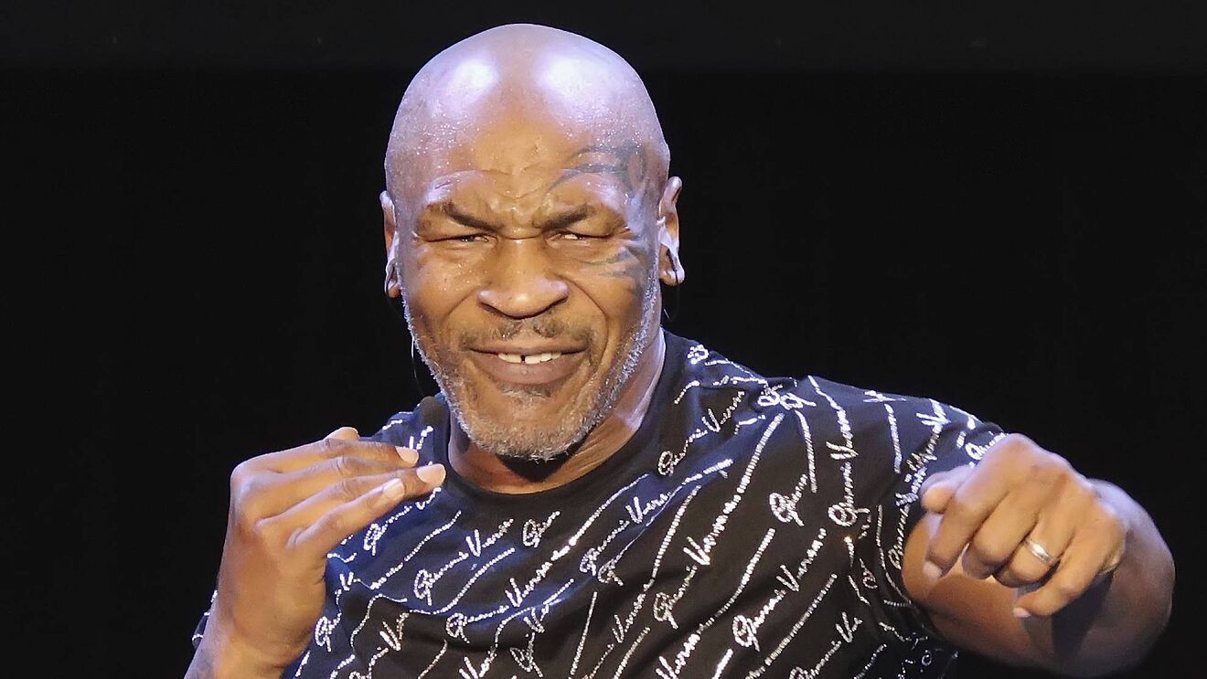 Boxing legend Mike Tyson cleared of charges for punching a man on a plane
