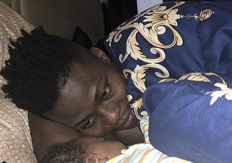 Cute Photo Of Reekado Banks & His Brother’s Son