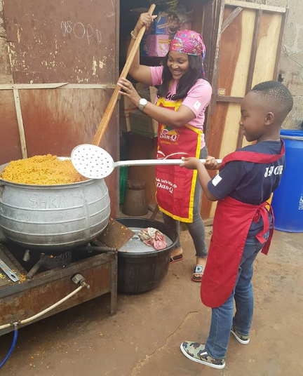 Mercy Aigbe And Her Son Juwon Spend His Birthday Cooking Catering To The Needy