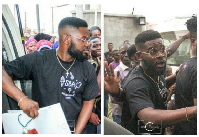 [PHOTOS] Falz Spotted Giving Christmas Gifts To People