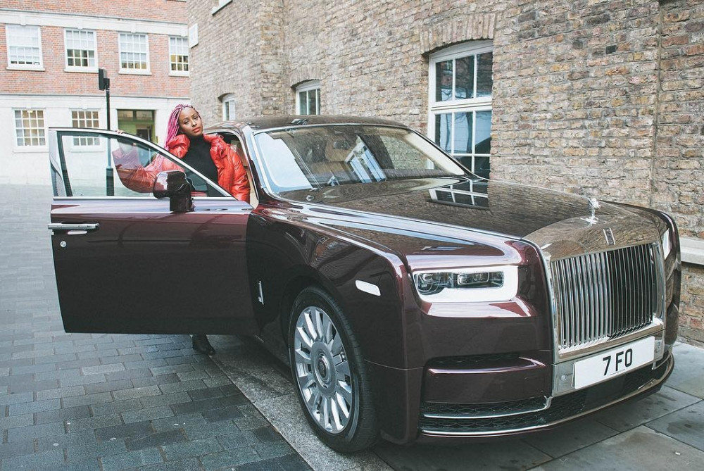 DJ Cuppy with the Rolls Royce; Takes Possession Of Her New Ride