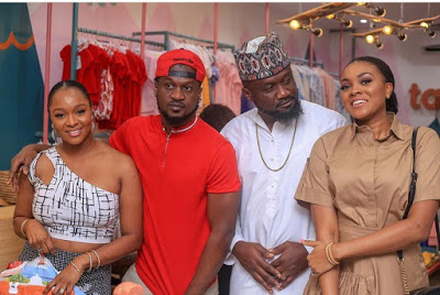 Paul and Jude Okoye pose with their wives