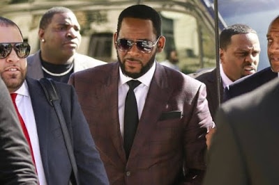 R. Kelly’s friends charged with harassing witnesses linked to Singer’s case