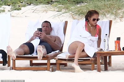 Jennifer Lopez puts killer curves on display in a pink bikini