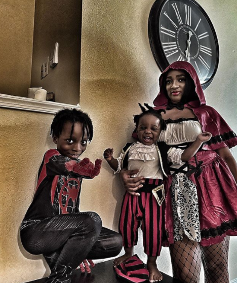 Cute photo of Olamide’s partner and their children in Halloween costumes