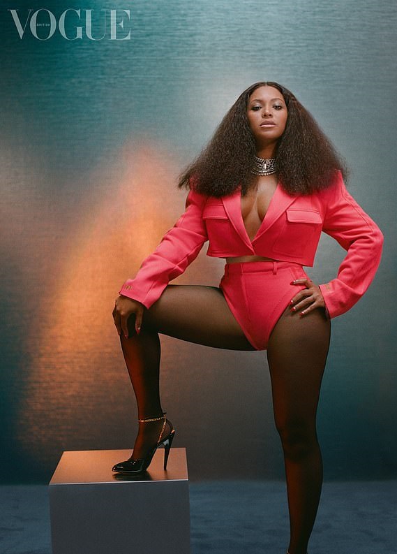 Beyonce SIZZLES in a backless red gown for British Vogue