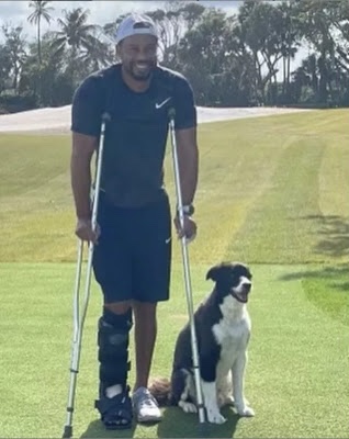 Tiger Woods steps out in crutches