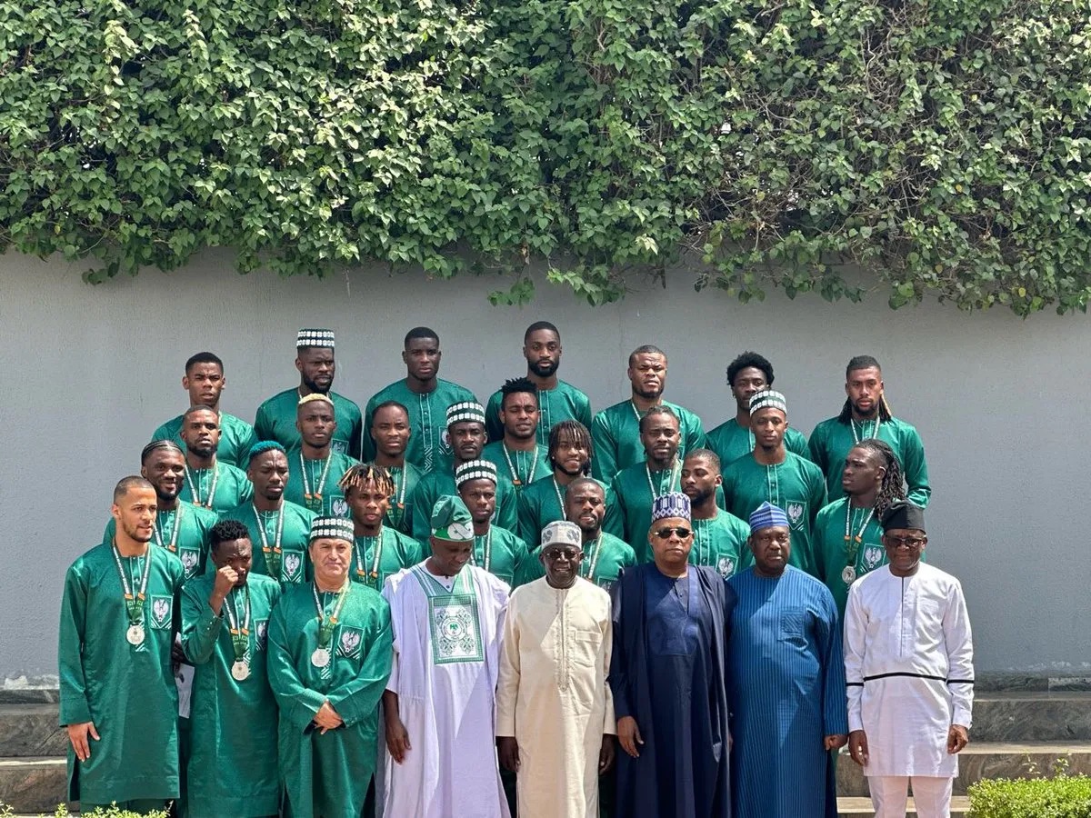 President Tinubu rewards Super Eagles with national award, flats, plots of land