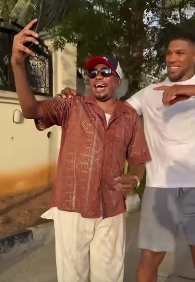 Anthony Joshua mingles with fans on the street of Lagos