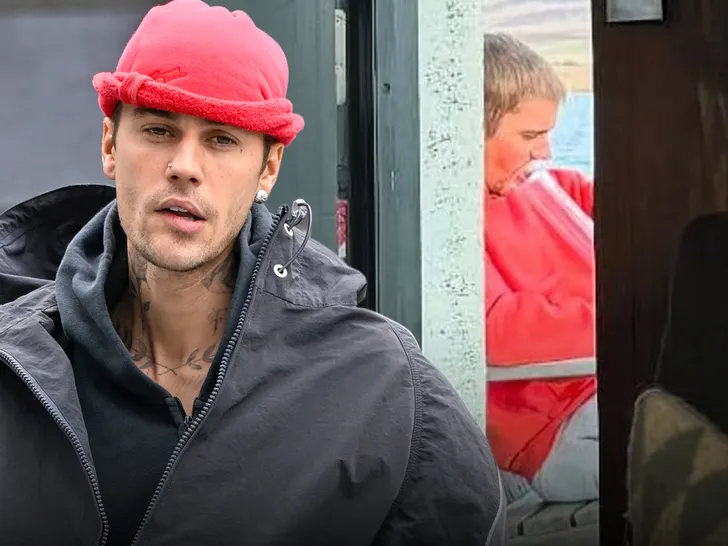 Justin Bieber photographed taking a hit off what appears to be a bong