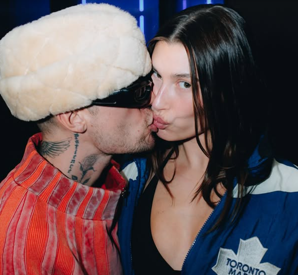 Justin Bieber puts a stop to all divorce rumours as he kisses wife Hailey in loved up photo