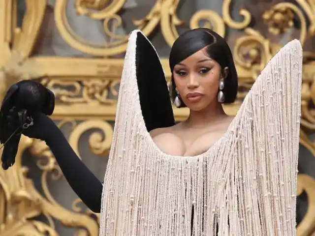 Cardi B uses live crow as fashion accessory for Paris couture